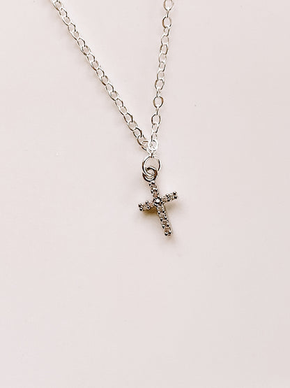 Studded cross charm necklace