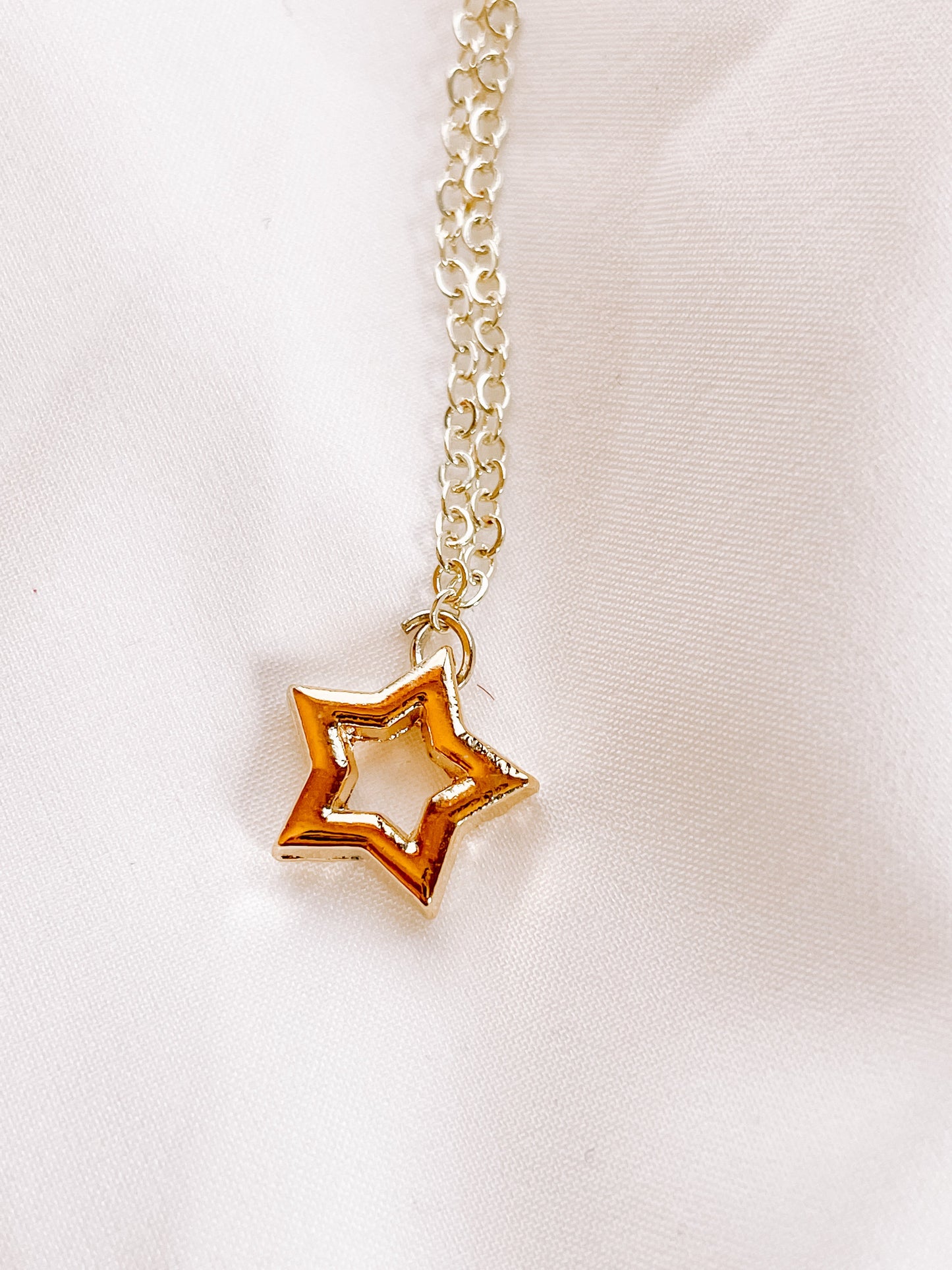 Cutout star charm necklace